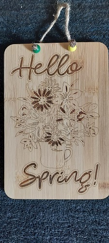 Bouquet engraved on bamboo.